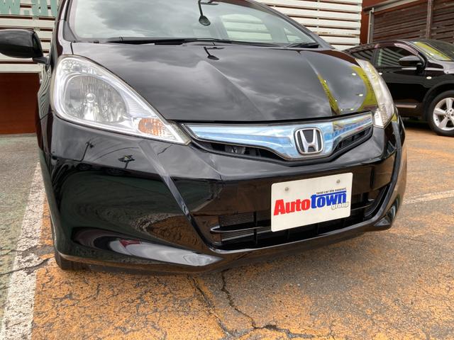 フィットハイブリッド スマートセレクション 後期モデル/車検2年+整備&保守付き/純正メモリーナビ(TV/CD/DVD/SD/USB)/バックカメラ/ETC/オートクルーズコントロール/HID(オートライト)/スマートキー/社外15インチアルミ(37枚目)