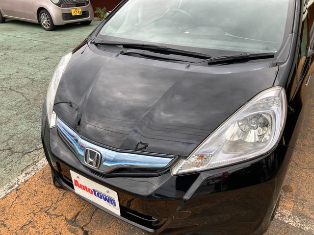 フィットハイブリッド スマートセレクション 後期モデル/車検2年+整備&保守付き/純正メモリーナビ(TV/CD/DVD/SD/USB)/バックカメラ/ETC/オートクルーズコントロール/HID(オートライト)/スマートキー/社外15インチアルミ(38枚目)