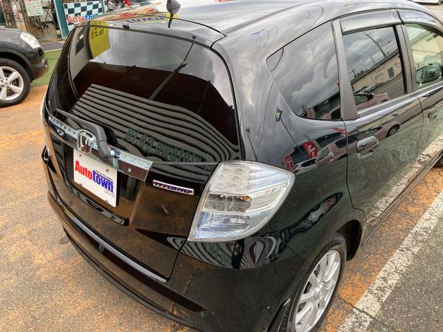 フィットハイブリッド スマートセレクション 後期モデル/車検2年+整備&保守付き/純正メモリーナビ(TV/CD/DVD/SD/USB)/バックカメラ/ETC/オートクルーズコントロール/HID(オートライト)/スマートキー/社外15インチアルミ(41枚目)