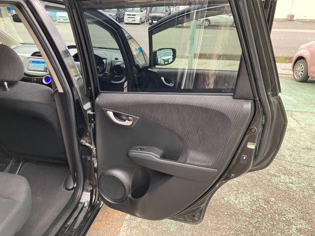 フィットハイブリッド スマートセレクション 後期モデル/車検2年+整備&保守付き/純正メモリーナビ(TV/CD/DVD/SD/USB)/バックカメラ/ETC/オートクルーズコントロール/HID(オートライト)/スマートキー/社外15インチアルミ(57枚目)