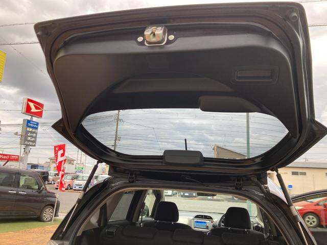 フィットハイブリッド スマートセレクション 後期モデル/車検2年+整備&保守付き/純正メモリーナビ(TV/CD/DVD/SD/USB)/バックカメラ/ETC/オートクルーズコントロール/HID(オートライト)/スマートキー/社外15インチアルミ(61枚目)