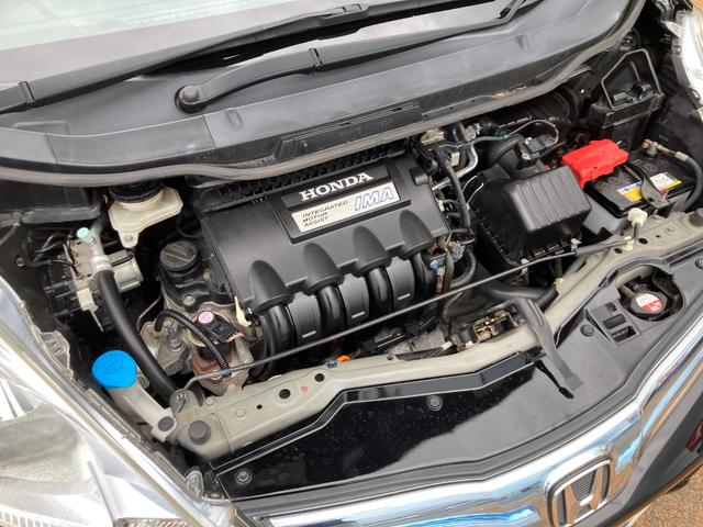 フィットハイブリッド スマートセレクション 後期モデル/車検2年+整備&保守付き/純正メモリーナビ(TV/CD/DVD/SD/USB)/バックカメラ/ETC/オートクルーズコントロール/HID(オートライト)/スマートキー/社外15インチアルミ(69枚目)