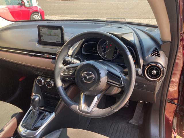 デミオ １３Ｓツーリング　Ｌパッケージ　後期モデル／車検２年＋整備＆保証付／衝突軽減ブレーキ／ナビ／ブルセグＴＶ／ＣＤ／ＤＶＤ／Ｂｌｕｅｔｏｏｔｈオーディオ／ＥＴＣ／ハーフレザーシート／ＬＥＤヘッドライト／ヘッドアップディスプレ／純正アルミ（52枚目）