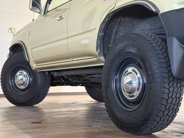 ハイラックスサーフ SSR-X アクティブパッケージIII ワイド ゴールド全塗装 4WD車輛 4RUNNER ナローカスタム リフトアップ サンルーフ DEAN16インチホイール YOKOHAMA GEOLANDER A/T TOYOTAエンブレム シートカバー(11枚目)