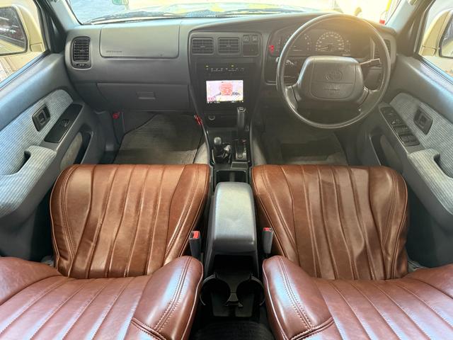 ハイラックスサーフ SSR-X アクティブパッケージIII ワイド ゴールド全塗装 4WD車輛 4RUNNER ナローカスタム リフトアップ サンルーフ DEAN16インチホイール YOKOHAMA GEOLANDER A/T TOYOTAエンブレム シートカバー(15枚目)