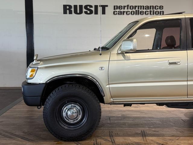 ハイラックスサーフ SSR-X アクティブパッケージIII ワイド ゴールド全塗装 4WD車輛 4RUNNER ナローカスタム リフトアップ サンルーフ DEAN16インチホイール YOKOHAMA GEOLANDER A/T TOYOTAエンブレム シートカバー(50枚目)