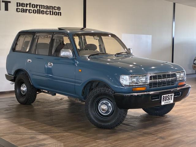 ランドクルーザー８０ ＶＸリミテッド　ミスティックブルー全塗装　４ＷＤ車輛　角目４灯　前後バンパーブラック塗装　１５インチアルミホイールマッドブラック塗装　ＹＯＫＯＨＡＭＡ　ＧＥＯＬＡＮＤＥＲタイヤ　サンルーフ　カロッツェリアナビ（7枚目）
