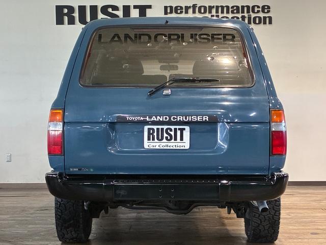 ランドクルーザー８０ ＶＸリミテッド　ミスティックブルー全塗装　４ＷＤ車輛　角目４灯　前後バンパーブラック塗装　１５インチアルミホイールマッドブラック塗装　ＹＯＫＯＨＡＭＡ　ＧＥＯＬＡＮＤＥＲタイヤ　サンルーフ　カロッツェリアナビ（9枚目）