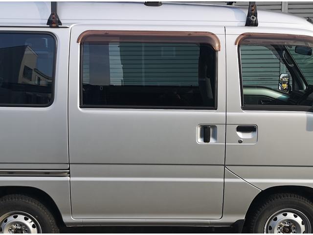 サンバーバン トランスポーター４ＷＤ　タイミングベルト交換済み　ハイルーフ　５ＭＴ　スタッドレスタイヤ装着　ルーフキャリア　社外ナビ　集中ドアロック　パワーウィンドウ　パワーステアリング　エアコン　スライドドア　禁煙車（14枚目）