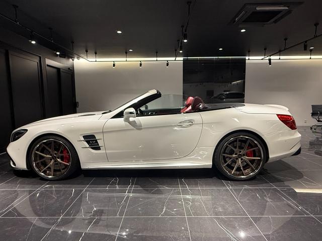 ＳＬ ＳＬ６３　ハイパーフォージド鍛造２０／２１インチＡＷ　マジックスカイルーフ　赤革　カーボンインテリア　ハーマンカードン　シートヒーター／クーラー　純正フロアマット　純正ナビ　ＴＶ　Ｂｌｕｅｔｏｏｔｈ　左ハンドル（27枚目）