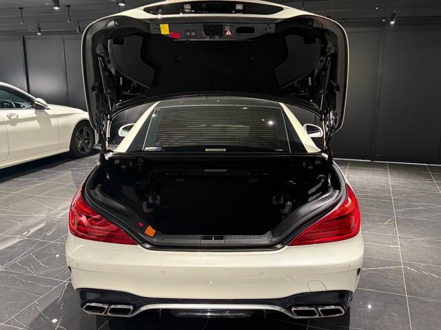 ＳＬ ＳＬ６３　ハイパーフォージド鍛造２０／２１インチＡＷ　マジックスカイルーフ　赤革　カーボンインテリア　ハーマンカードン　シートヒーター／クーラー　純正フロアマット　純正ナビ　ＴＶ　Ｂｌｕｅｔｏｏｔｈ　左ハンドル（32枚目）