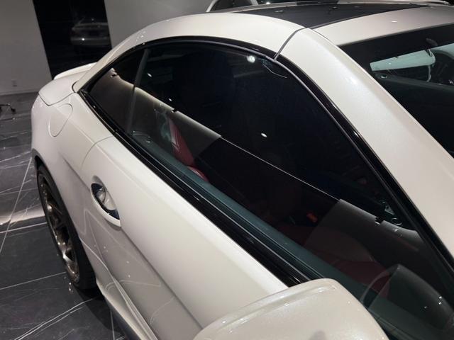 ＳＬ ＳＬ６３　ハイパーフォージド鍛造２０／２１インチＡＷ　マジックスカイルーフ　赤革　カーボンインテリア　ハーマンカードン　シートヒーター／クーラー　純正フロアマット　純正ナビ　ＴＶ　Ｂｌｕｅｔｏｏｔｈ　左ハンドル（57枚目）