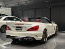 ＳＬ６３　ハイパーフォージド鍛造２０／２１インチＡＷ　マジックスカイルーフ　赤革　カーボンインテリア　ハーマンカードン　シートヒーター／クーラー　純正フロアマット　純正ナビ　ＴＶ　Ｂｌｕｅｔｏｏｔｈ　左ハンドル（28枚目）