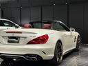 ＳＬ６３　ハイパーフォージド鍛造２０／２１インチＡＷ　マジックスカイルーフ　赤革　カーボンインテリア　ハーマンカードン　シートヒーター／クーラー　純正フロアマット　純正ナビ　ＴＶ　Ｂｌｕｅｔｏｏｔｈ　左ハンドル（50枚目）