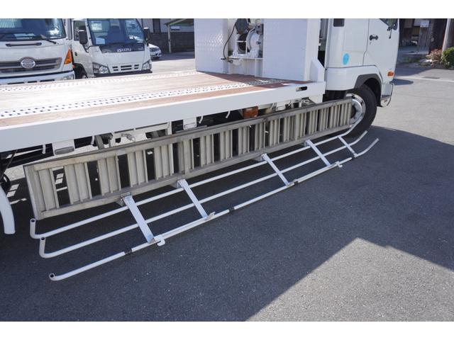 ファイター ラジコン付きハイジャッキセルフ積載車　増トン７トン積載　ラジコン付き　６Ｍ６０エンジン２４０ＰＳ　ベッド付き　エアサスコントローラー　ウィンチ付き　タダノハイジャッキセルフ　荷台内寸６４３ｃｍ・２３８ｃｍ　あゆみ付き　アルミホイール（34枚目）