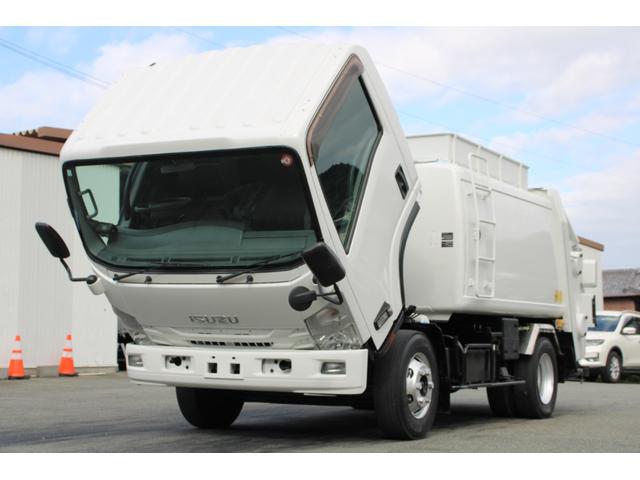 エルフトラック パッカー車/塵芥車 3.4t積載 6.5立米 回転式 新明和GR064-1634S2 巻込み式 連続積込 汚水タンク 電格ミラー サイドラダー 箱上キャリア スペアキー 車両総重量7995kg 荷台内寸4131-2051-1432(14枚目)