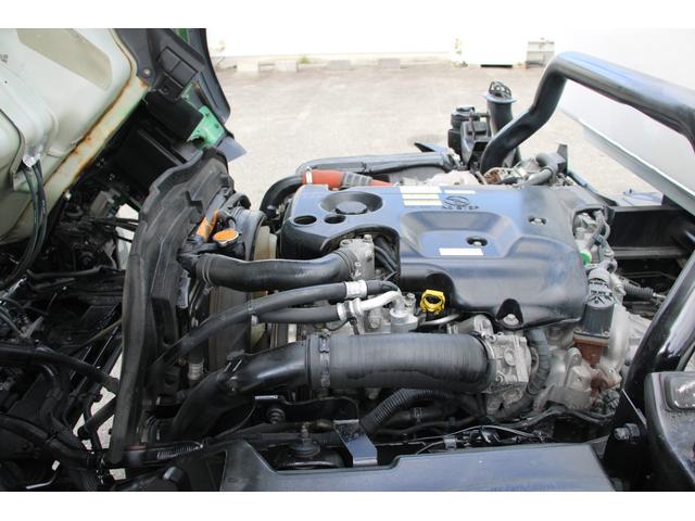 エルフトラック パッカー車/塵芥車 3.4t積載 6.5立米 回転式 新明和GR064-1634S2 巻込み式 連続積込 汚水タンク 電格ミラー サイドラダー 箱上キャリア スペアキー 車両総重量7995kg 荷台内寸4131-2051-1432(24枚目)