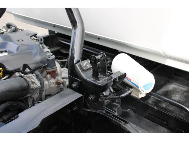 エルフトラック パッカー車/塵芥車 3.4t積載 6.5立米 回転式 新明和GR064-1634S2 巻込み式 連続積込 汚水タンク 電格ミラー サイドラダー 箱上キャリア スペアキー 車両総重量7995kg 荷台内寸4131-2051-1432(26枚目)