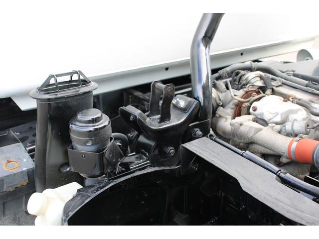 エルフトラック パッカー車/塵芥車 3.4t積載 6.5立米 回転式 新明和GR064-1634S2 巻込み式 連続積込 汚水タンク 電格ミラー サイドラダー 箱上キャリア スペアキー 車両総重量7995kg 荷台内寸4131-2051-1432(32枚目)