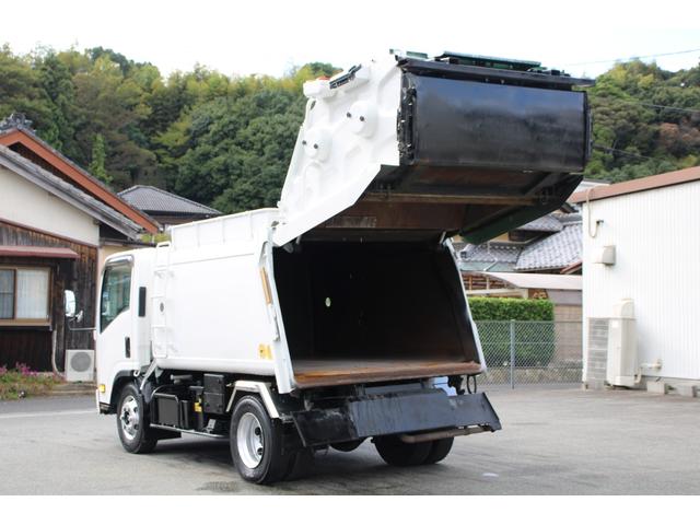 エルフトラック パッカー車/塵芥車 3.4t積載 6.5立米 回転式 新明和GR064-1634S2 巻込み式 連続積込 汚水タンク 電格ミラー サイドラダー 箱上キャリア スペアキー 車両総重量7995kg 荷台内寸4131-2051-1432(37枚目)