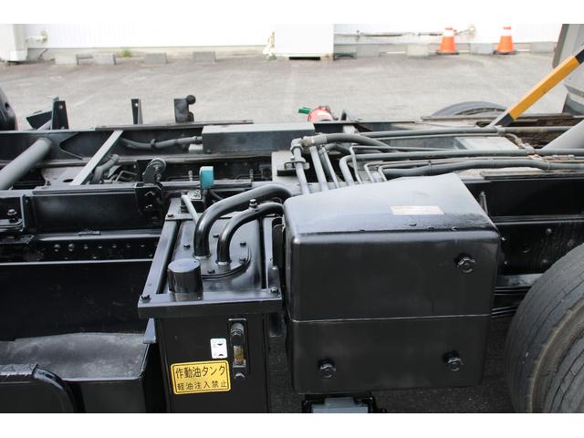 エルフトラック パッカー車/塵芥車 3.4t積載 6.5立米 回転式 新明和GR064-1634S2 巻込み式 連続積込 汚水タンク 電格ミラー サイドラダー 箱上キャリア スペアキー 車両総重量7995kg 荷台内寸4131-2051-1432(50枚目)