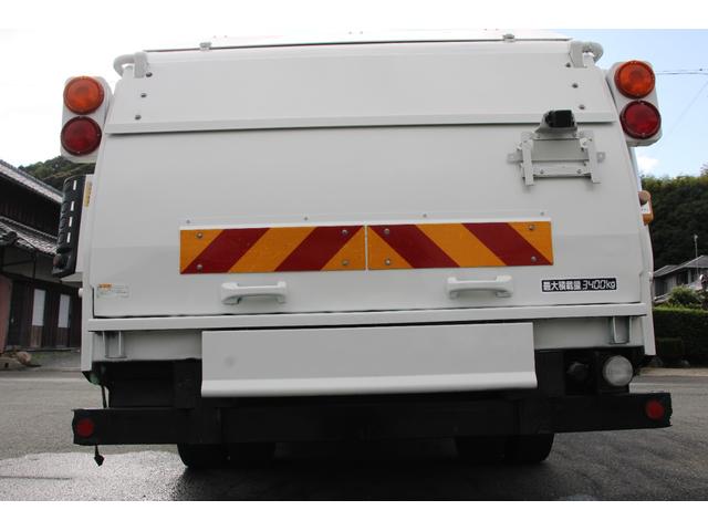 エルフトラック パッカー車/塵芥車 3.4t積載 6.5立米 回転式 新明和GR064-1634S2 巻込み式 連続積込 汚水タンク 電格ミラー サイドラダー 箱上キャリア スペアキー 車両総重量7995kg 荷台内寸4131-2051-1432(53枚目)