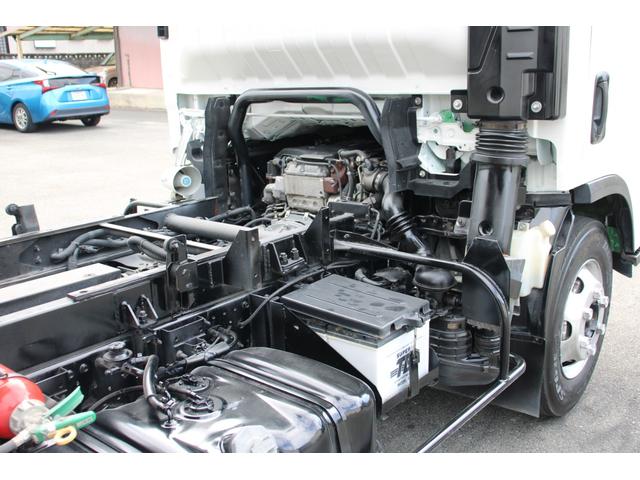 エルフトラック パッカー車/塵芥車 3.4t積載 6.5立米 回転式 新明和GR064-1634S2 巻込み式 連続積込 汚水タンク 電格ミラー サイドラダー 箱上キャリア スペアキー 車両総重量7995kg 荷台内寸4131-2051-1432(58枚目)