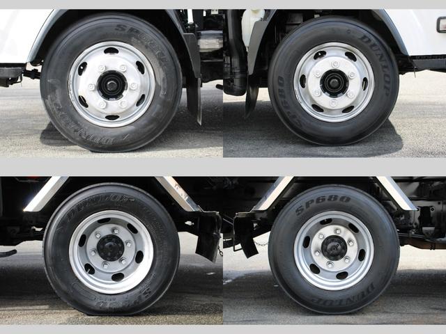 エルフトラック パッカー車/塵芥車 3.4t積載 6.5立米 回転式 新明和GR064-1634S2 巻込み式 連続積込 汚水タンク 電格ミラー サイドラダー 箱上キャリア スペアキー 車両総重量7995kg 荷台内寸4131-2051-1432(62枚目)