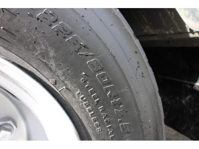 エルフトラック パッカー車/塵芥車 3.4t積載 6.5立米 回転式 新明和GR064-1634S2 巻込み式 連続積込 汚水タンク 電格ミラー サイドラダー 箱上キャリア スペアキー 車両総重量7995kg 荷台内寸4131-2051-1432(63枚目)