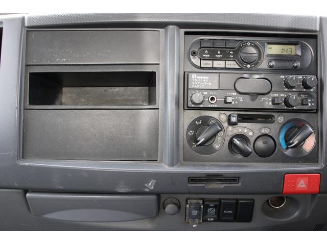 エルフトラック パッカー車/塵芥車 3.4t積載 6.5立米 回転式 新明和GR064-1634S2 巻込み式 連続積込 汚水タンク 電格ミラー サイドラダー 箱上キャリア スペアキー 車両総重量7995kg 荷台内寸4131-2051-1432(66枚目)