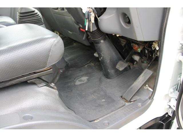 エルフトラック パッカー車/塵芥車 3.4t積載 6.5立米 回転式 新明和GR064-1634S2 巻込み式 連続積込 汚水タンク 電格ミラー サイドラダー 箱上キャリア スペアキー 車両総重量7995kg 荷台内寸4131-2051-1432(72枚目)