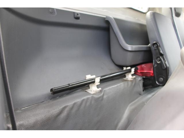 エルフトラック パッカー車/塵芥車 3.4t積載 6.5立米 回転式 新明和GR064-1634S2 巻込み式 連続積込 汚水タンク 電格ミラー サイドラダー 箱上キャリア スペアキー 車両総重量7995kg 荷台内寸4131-2051-1432(74枚目)