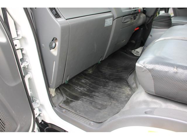 エルフトラック パッカー車/塵芥車 3.4t積載 6.5立米 回転式 新明和GR064-1634S2 巻込み式 連続積込 汚水タンク 電格ミラー サイドラダー 箱上キャリア スペアキー 車両総重量7995kg 荷台内寸4131-2051-1432(77枚目)