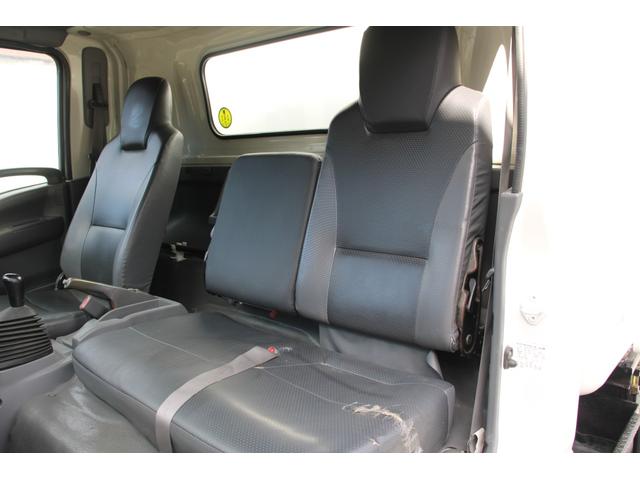 エルフトラック パッカー車/塵芥車 3.4t積載 6.5立米 回転式 新明和GR064-1634S2 巻込み式 連続積込 汚水タンク 電格ミラー サイドラダー 箱上キャリア スペアキー 車両総重量7995kg 荷台内寸4131-2051-1432(78枚目)