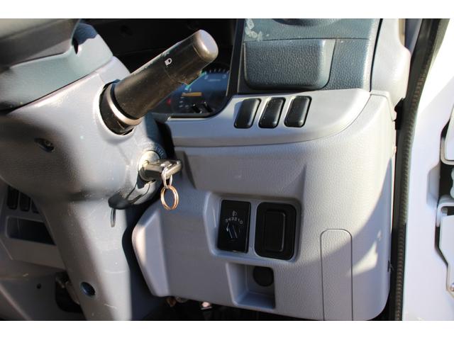 キャンター 平ボディ　１．５ｔ積載　４ＷＤ　１．５ｔ積載　３方開　４ＷＤ　全低床　ＥＴＣ　車両総重量４０１５ｋｇ　荷台内寸３１２２－１６０９－３７３　床地上高８８４（55枚目）