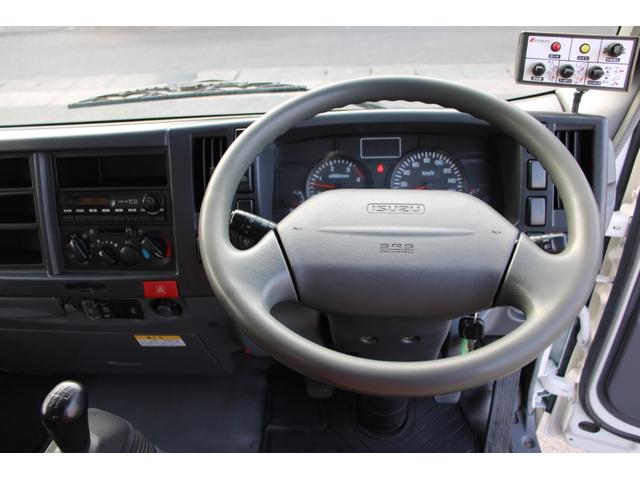 エルフトラック パッカー車/塵芥車 3.05t積載 5.9立米 プレス式 極東GB59-26-S 連続スイッチ 汚水タンク バックモニター 電格ミラー レザー調シートカバー スペアキー 車両総重量7995kg 荷台内寸3780-1980-1700(63枚目)