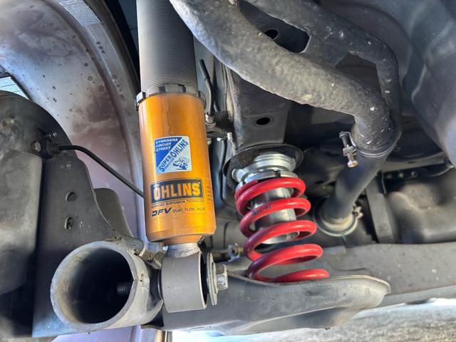 マーチ ニスモ　Ｓ　禁煙車　ＨＫＳマフラー　オーリンズ（ＡＺＵＲＩＴＥ）車高調　サスペンションプラスサス　クスコＬＳＤ　純正ナビＴＶ　バックカメラ　インテリキー　ＬＥＤヘッドライト　ＥＴＣ（7枚目）