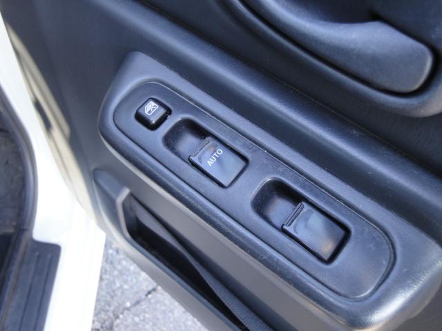 ジムニー FISフリースタイルワールドカップリミテッド パートタイム4WD・インタークーラーターボ・純正アルミ・CD/MD・AM/FMラジオ・フォグライト・シートヒーター・ミラーヒーター・電動格納ミラー・キーレスエントリー(20枚目)