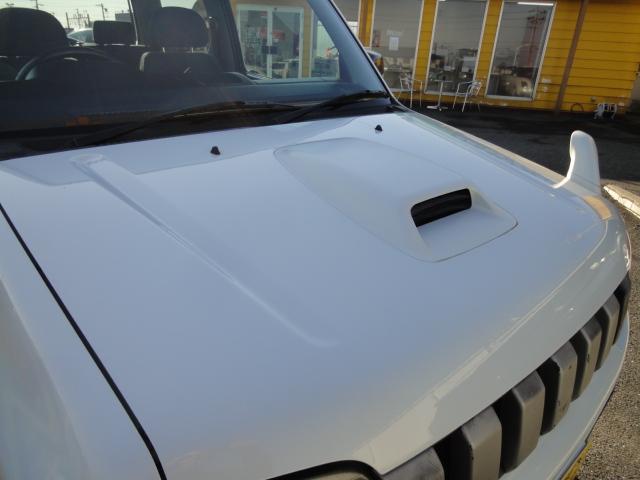ジムニー FISフリースタイルワールドカップリミテッド パートタイム4WD・インタークーラーターボ・純正アルミ・CD/MD・AM/FMラジオ・フォグライト・シートヒーター・ミラーヒーター・電動格納ミラー・キーレスエントリー(26枚目)
