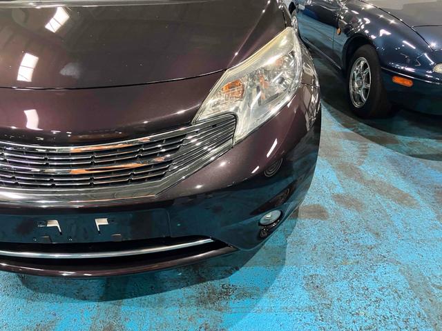 ノート ナビ TV オートライト キーレスエントリー アイドリングストップ 電動格納ミラー CVT CD ミュージックプレイヤー接続可 エアコン パワーステアリング パワーウィンドウ 運転席エアバッグ(22枚目)