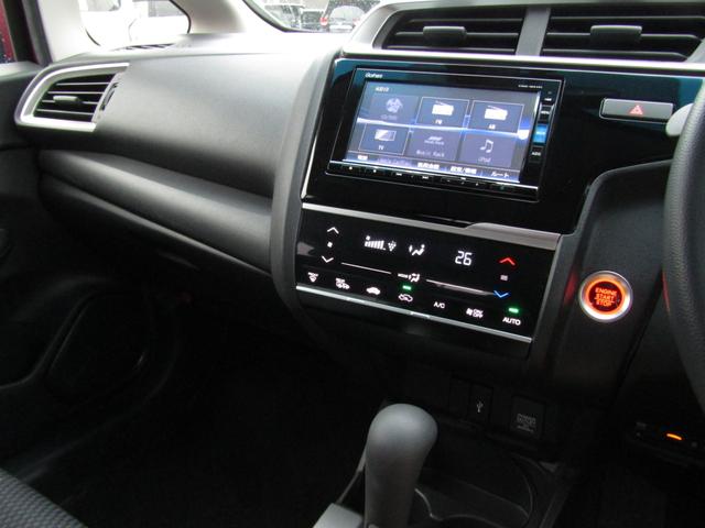 フィット 13G・Lホンダセンシング ワンオーナー 純正ナビ バックカメラ エンスタ ETC フルセグ Bluetooth USB LEDライト オートライト オートエアコン ドアバイザー サイドエアバッグ アームレストコンソール(9枚目)