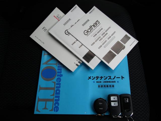 フィット 13G・Lホンダセンシング ワンオーナー 純正ナビ バックカメラ エンスタ ETC フルセグ Bluetooth USB LEDライト オートライト オートエアコン ドアバイザー サイドエアバッグ アームレストコンソール(54枚目)