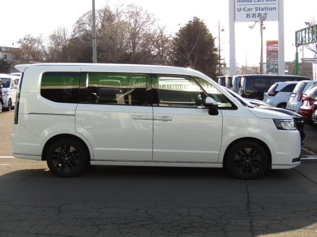 ステップワゴン スパーダ　当社レンタカーＵＰ　純正９インチナビ　バックカメラ　ホンダセンシング　前側ドラレコ　ＥＴＣ　両側ＰＳＤ　フルセグ　Ｂｌｕｅｔｏｏｔｈ　ＵＳＢ　ＬＥＤライト　オートエアコン　電動パーキングブレーキ（61枚目）