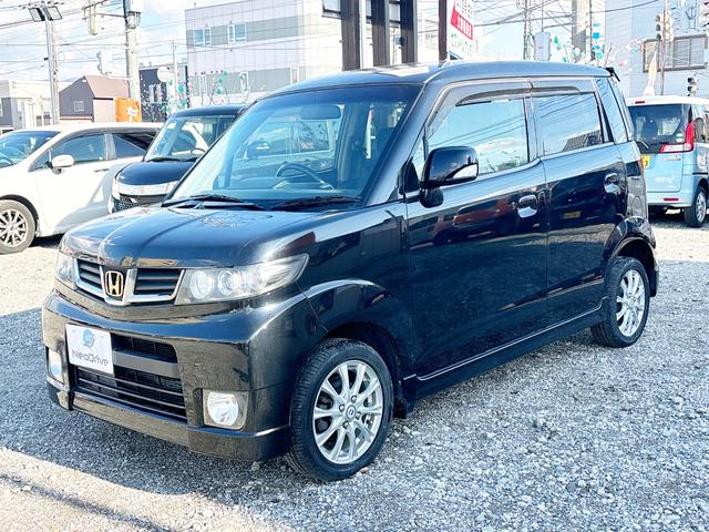 ゼストスパーク Wターボ 4WD ローンに不安な方 本州仕入 社外ナビ フルセグTV スマートキー 社外アルミ HID ベンチシート フロントフォグランプ CD再生 DVD再生 Bluetooth 全国 札幌 函館 リース(18枚目)