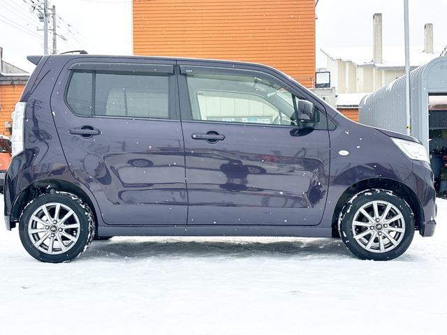 ワゴンＲスティングレー Ｘ　４ＷＤ　ローンに不安な方　１年保証　プッシュスタート　純正オーディオ　ＨＩＤ　シートヒーター　社外アルミ　ＡＢＳ　横滑り防止装置　エンジンスタータースマートキー　全国　札幌　函館　優遇ローン　リース（68枚目）