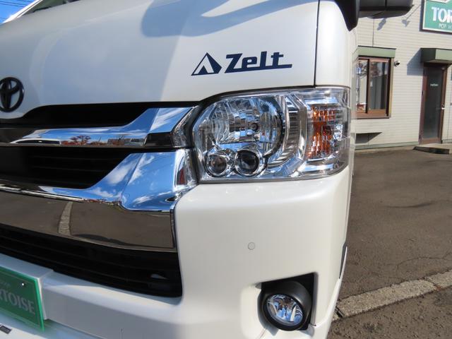 ハイエースワゴン GL キャンピング 東和モーター製ツエルト ベバストFFヒーター サブバッテリー走行&外部充電 上蓋式冷蔵庫 電子レンジ 4WD(3枚目)