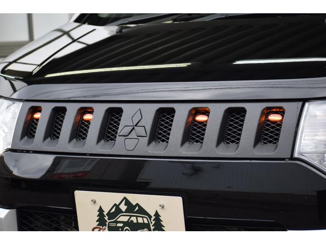 デリカＤ：５ Ｄ　パワーパッケージ　４ＷＤ　クルーズコントロール／前席シートヒーター／チッピング塗装グリル／キセノンヘッドライト／ＬＥＤフォグランプ／社外メモリーナビ／ＥＴＣ］車載器／バックカメラ／パドルシフト／７人乗りキャプテンシート（22枚目）