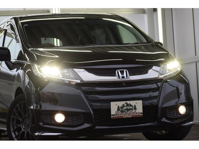 オデッセイ 2.4アブソルートEXホンダセンシング 4WD 4WD ハーフレザー/マルチビューモニター/フリップダウンモニター/パワーシート/大型アームレスト/ETC車載器/両側パワースライドドア/革巻きステアリング/ENKEI18インチアルミ(19枚目)