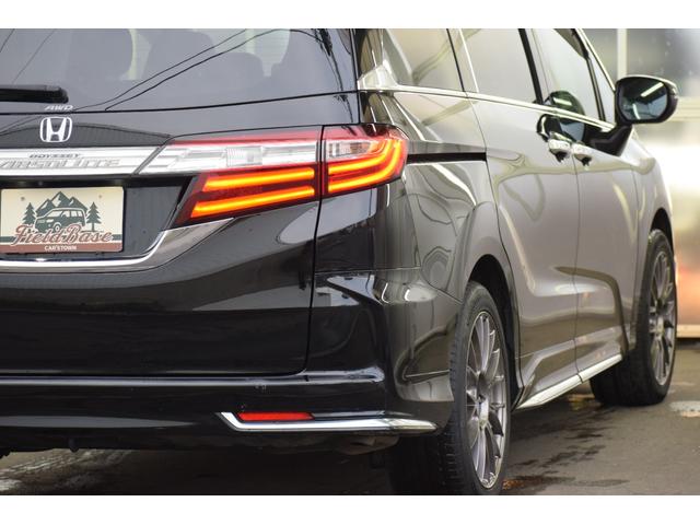 オデッセイ 2.4アブソルートEXホンダセンシング 4WD 4WD ハーフレザー/マルチビューモニター/フリップダウンモニター/パワーシート/大型アームレスト/ETC車載器/両側パワースライドドア/革巻きステアリング/ENKEI18インチアルミ(24枚目)