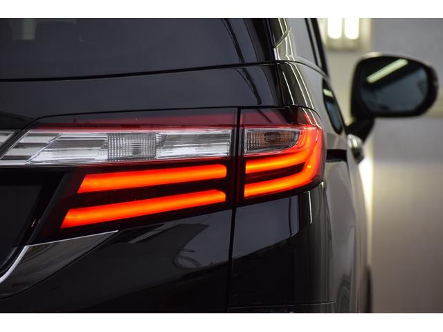 オデッセイ 2.4アブソルートEXホンダセンシング 4WD 4WD ハーフレザー/マルチビューモニター/フリップダウンモニター/パワーシート/大型アームレスト/ETC車載器/両側パワースライドドア/革巻きステアリング/ENKEI18インチアルミ(25枚目)